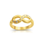 Angled view of the 14K gold infinity ring highlighting diamond placement and texture