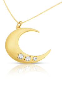 Front view of the 14K gold Lighting Moon Necklace with three diamonds set into a crescent moon pendant