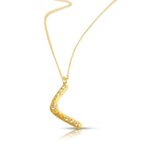 Sculptural boomerang necklace in matte 14K yellow gold