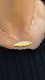 Model wearing b.Tsaritsa Transurfing Necklace from the Alternatives Space Collection